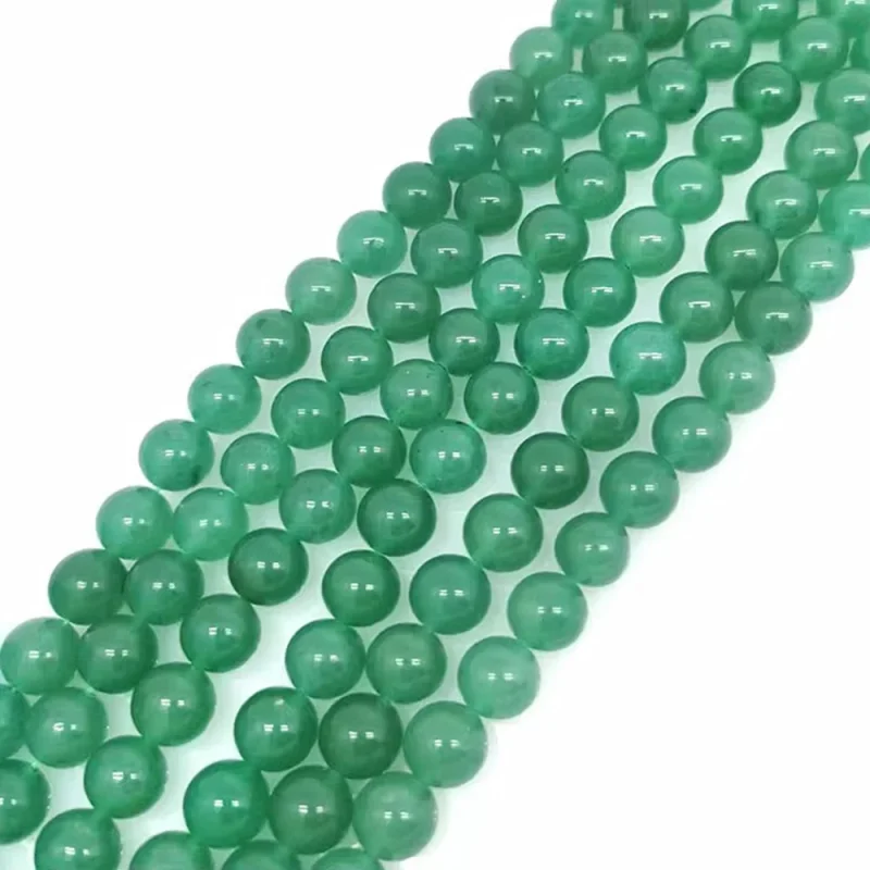 Strand of 8mm Green Aventurine round beads showing natural green color and polish