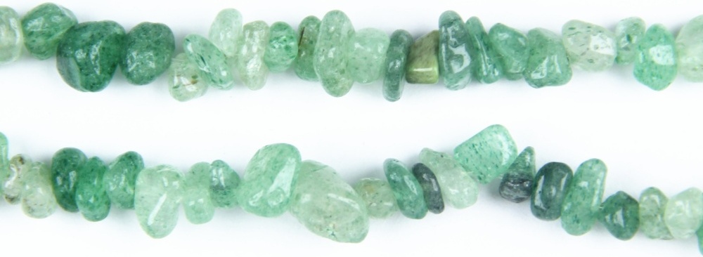 Vibrant green Strawberry Quartz chip beads, perfect for making jewelry with natural healing properties and a unique look