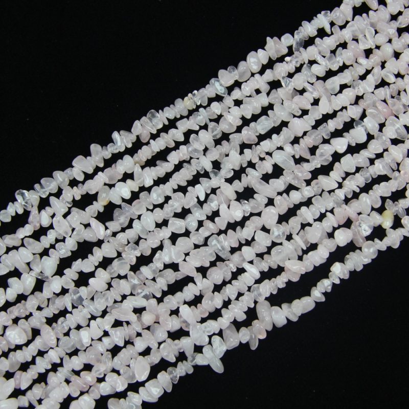 Natural Rose Quartz chip beads, perfect for creating beautiful, soothing jewelry pieces with a soft pink hue