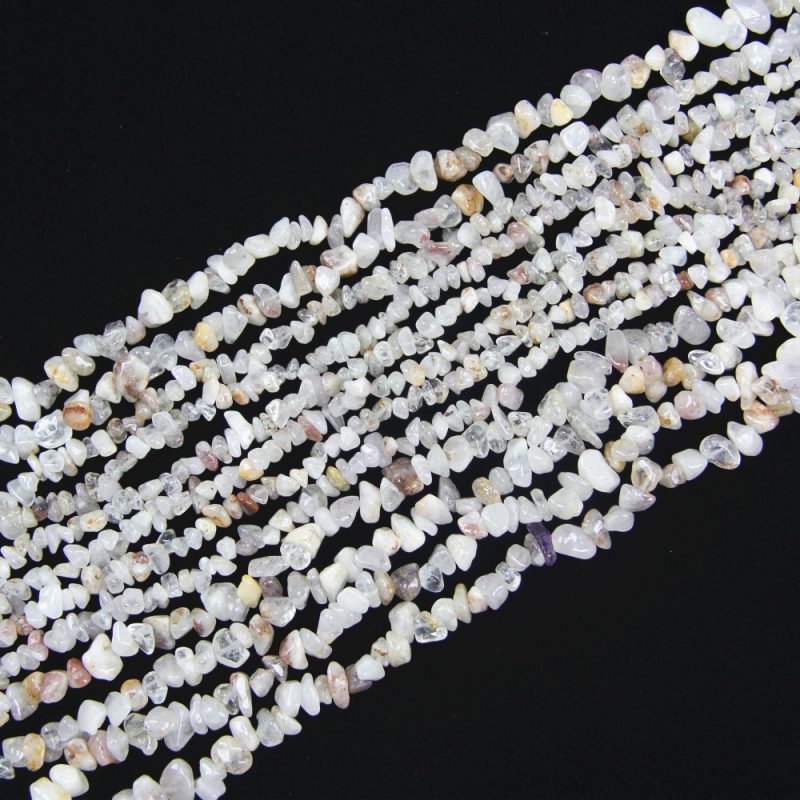 Unlock the healing power of the Super Seven with these Melody Stone Beads. These 5-8mm chip beads combine seven natural stones, offering a dynamic energy that enhances creativity and personal growth. Ideal for making unique and meaningful jewelry pieces such as pendants, earrings, and bracelets.