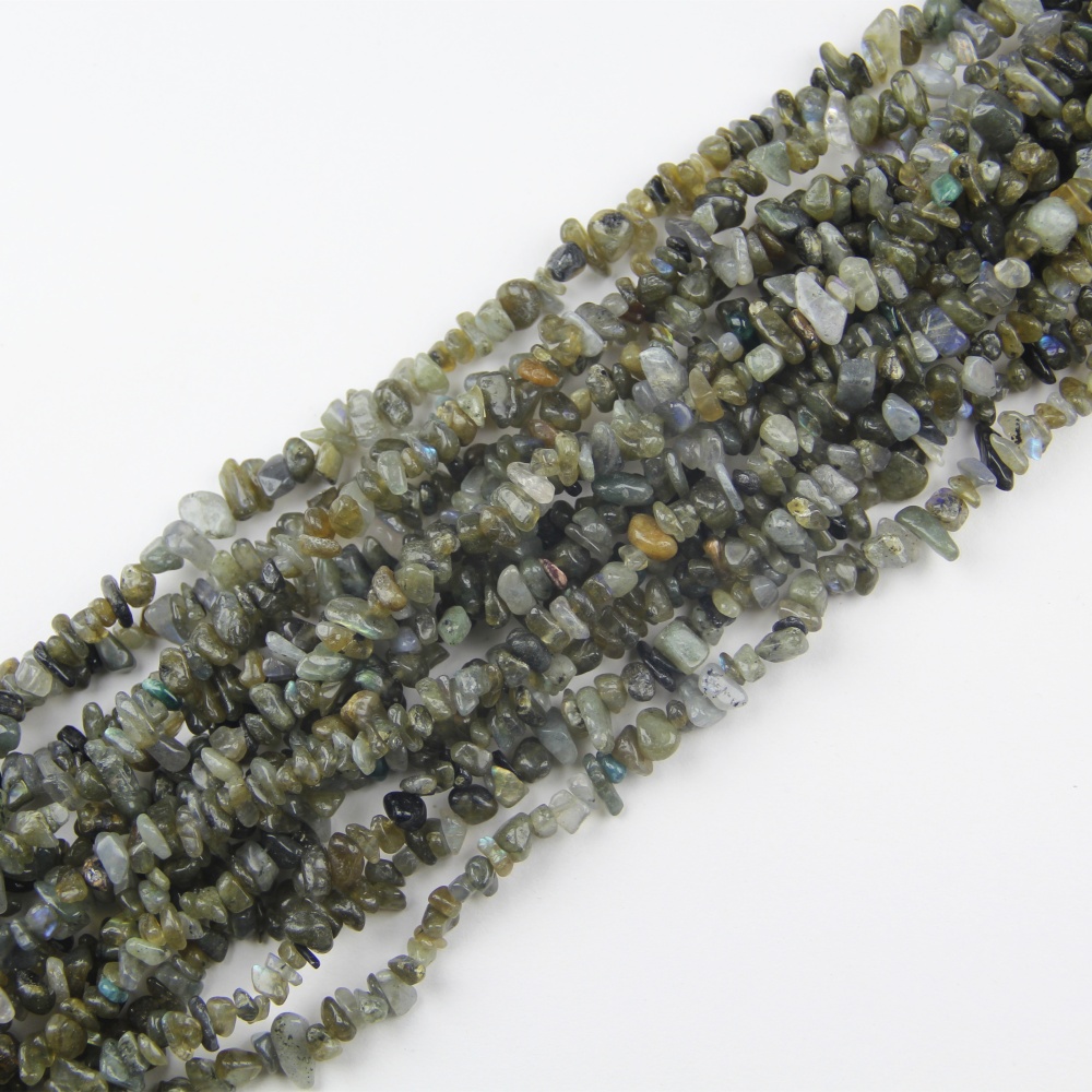 Irregular Labradorite gemstone beads, tumbled for smooth finish, retaining natural colors and flashes for professional jewelry making.