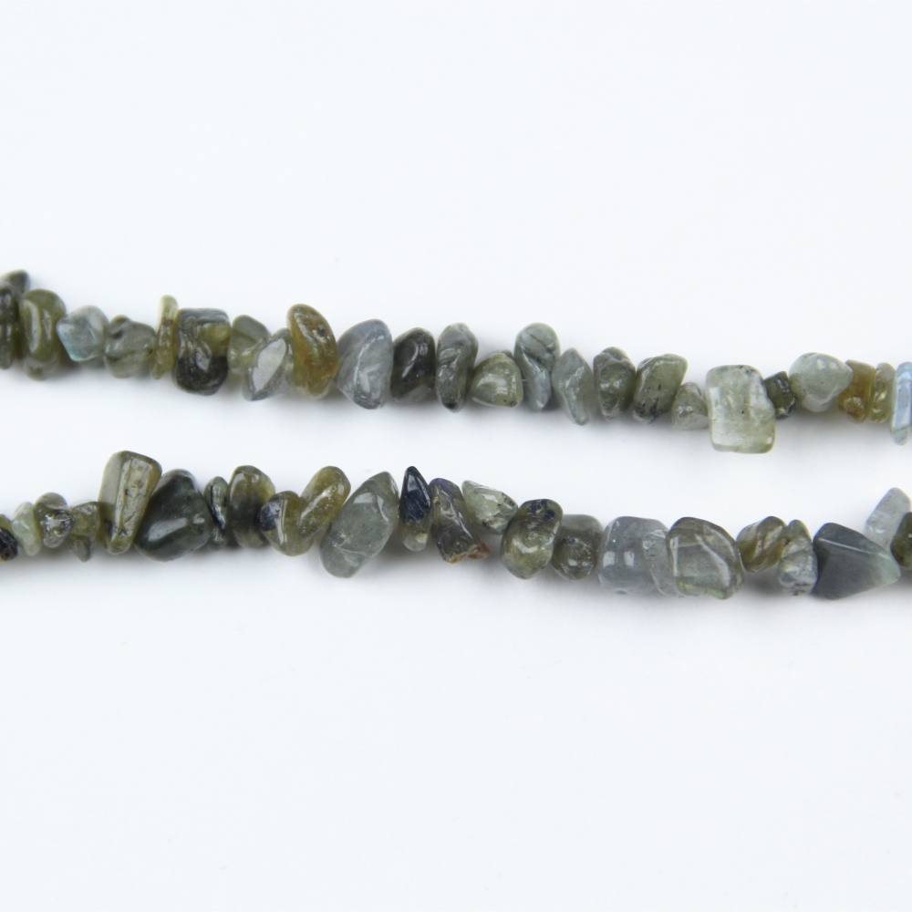 Bulk Labradorite irregular gemstone chip beads, polished and drilled, ready for wholesale, jewelry designers, and craft enthusiasts.