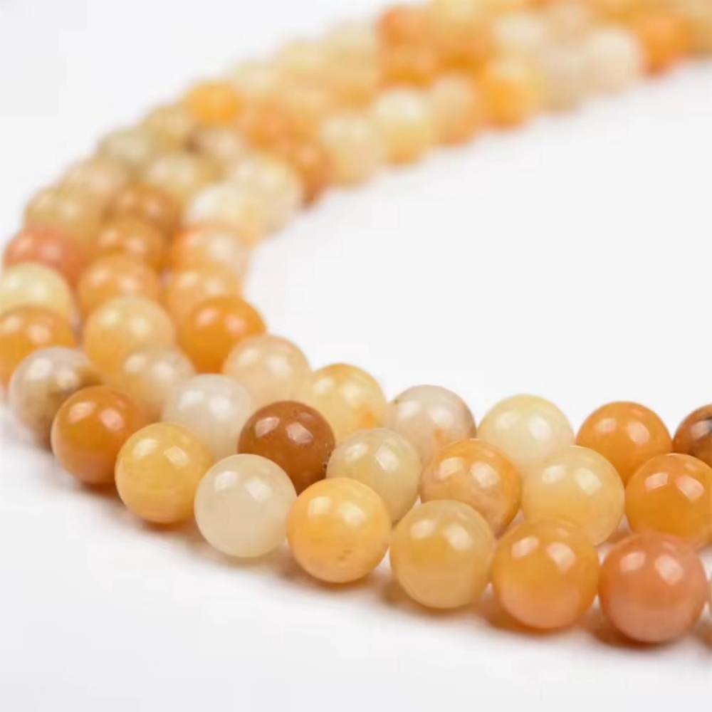 Authentic glow in Loose Gemstone Beads! Tiny platelets flash like gold dust in light