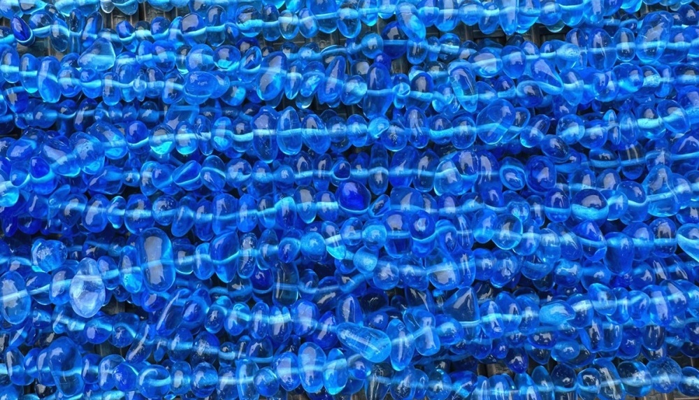 blue crushed glass nuggets paired with silver findings for elegant handmade necklace.