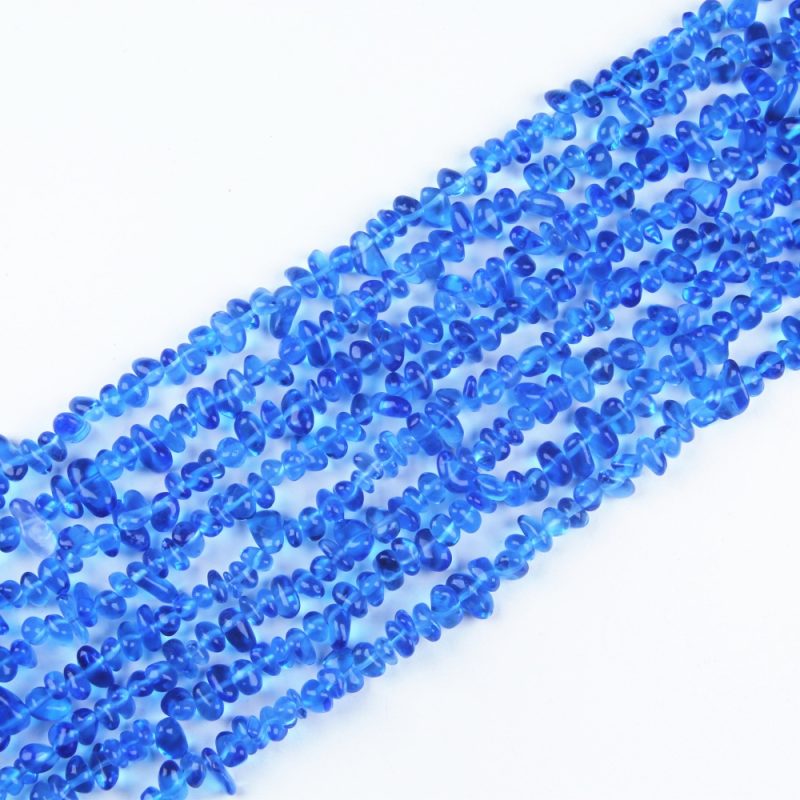 Real-size view of 80cm blue nugget bead strand in hand – feel the quality and weight (~65g).