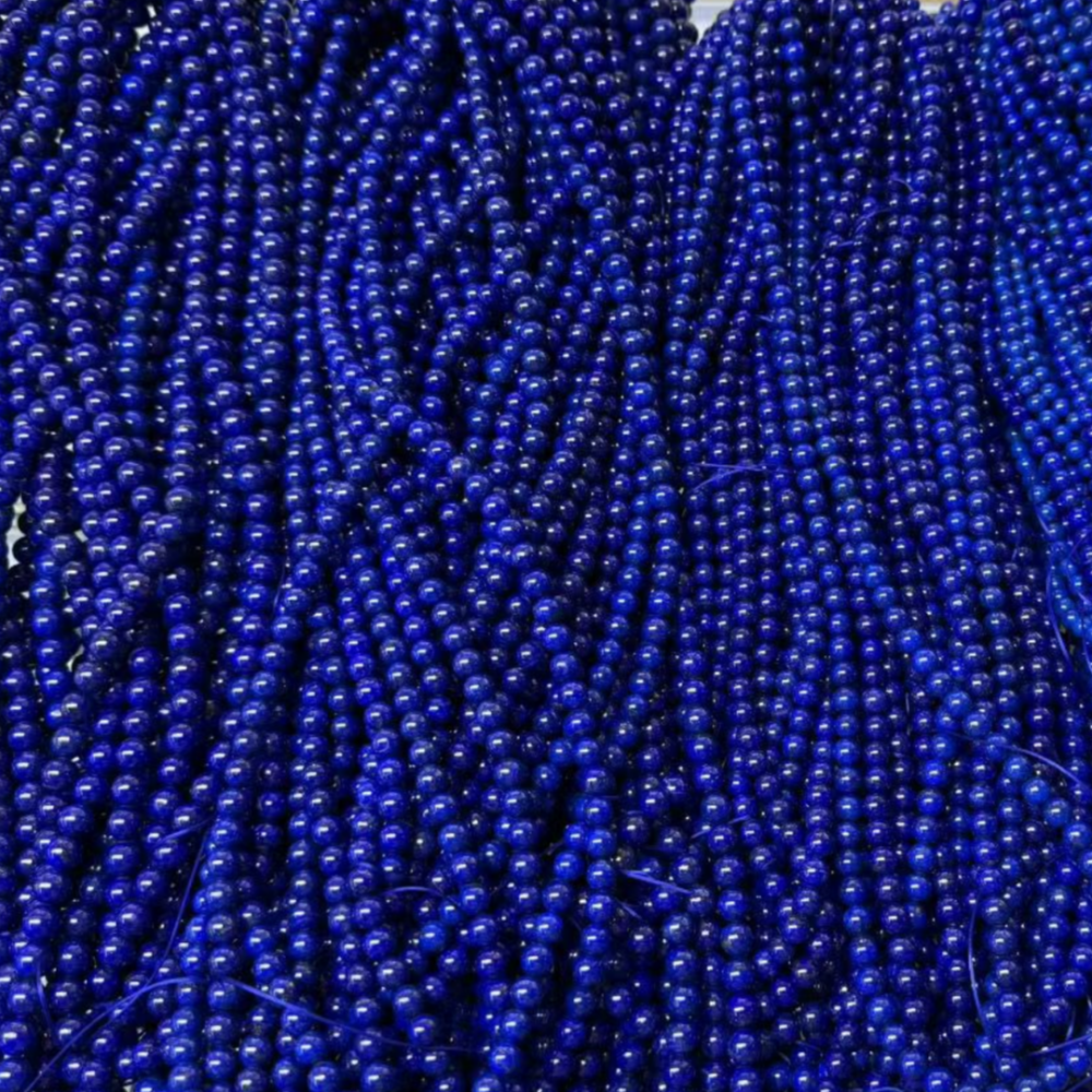 This Lapis Lazuli bracelet features round beads (2-16mm) that promote chakra healing, emotional balance, and clarity. Perfect for enhancing personal energy