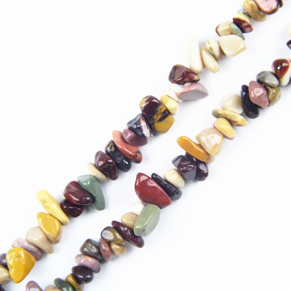 Irregular mookaite chips drilled for jewelry making and DIY designs