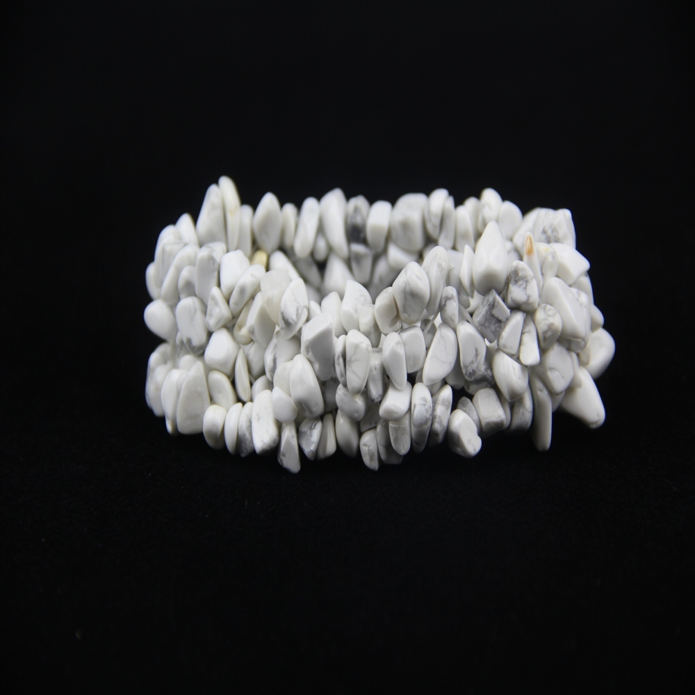 Natural stone bracelet displayed with white howlite raw stones and beads – unique White Turquoise Bracelet or White Howlite Bracelet stone chip bracelet with authentic healing energy.